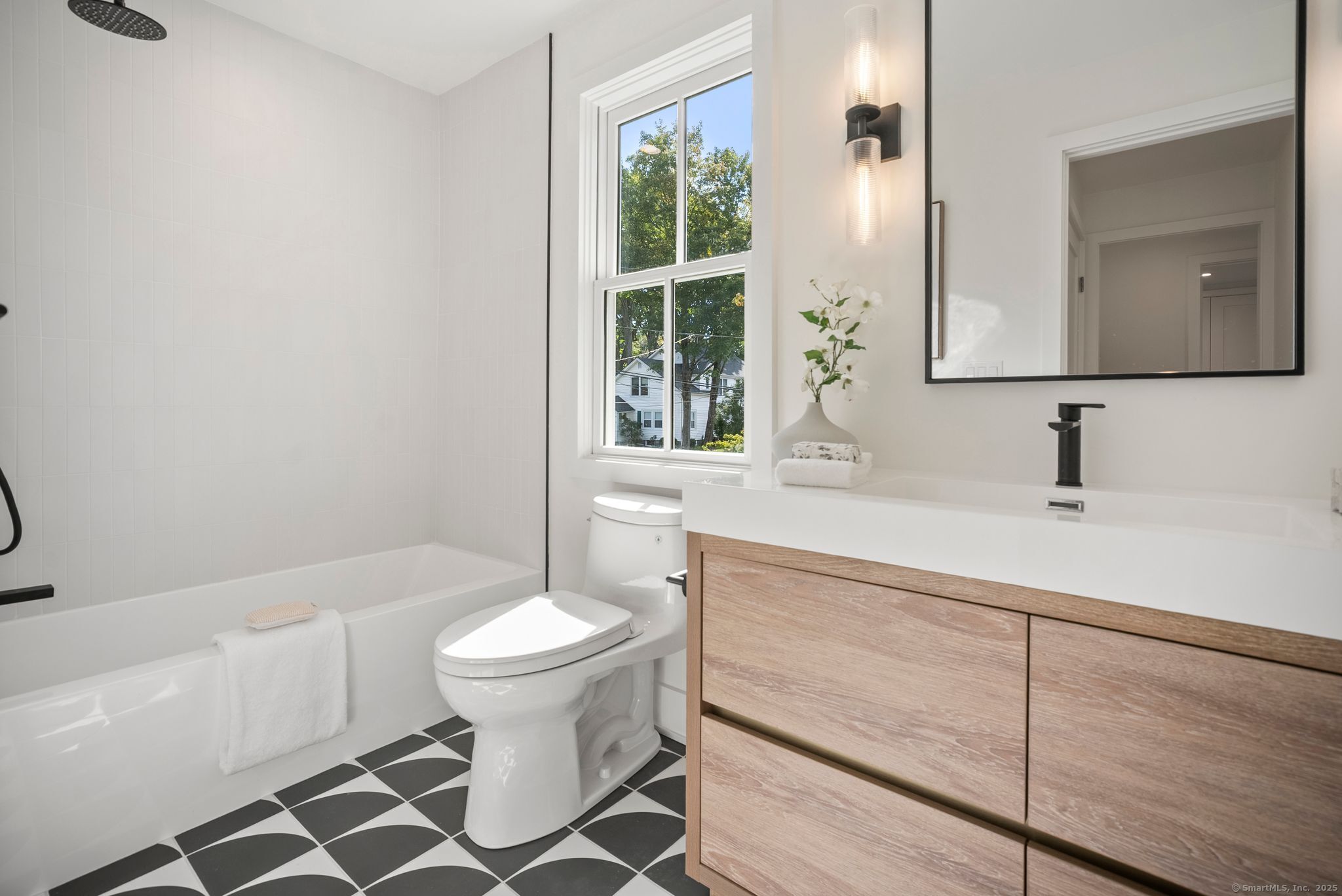 7 Wild Rose Road Westport, CT 06880 - Photo 24 of 33 a bathroom with a sink toilet and shower