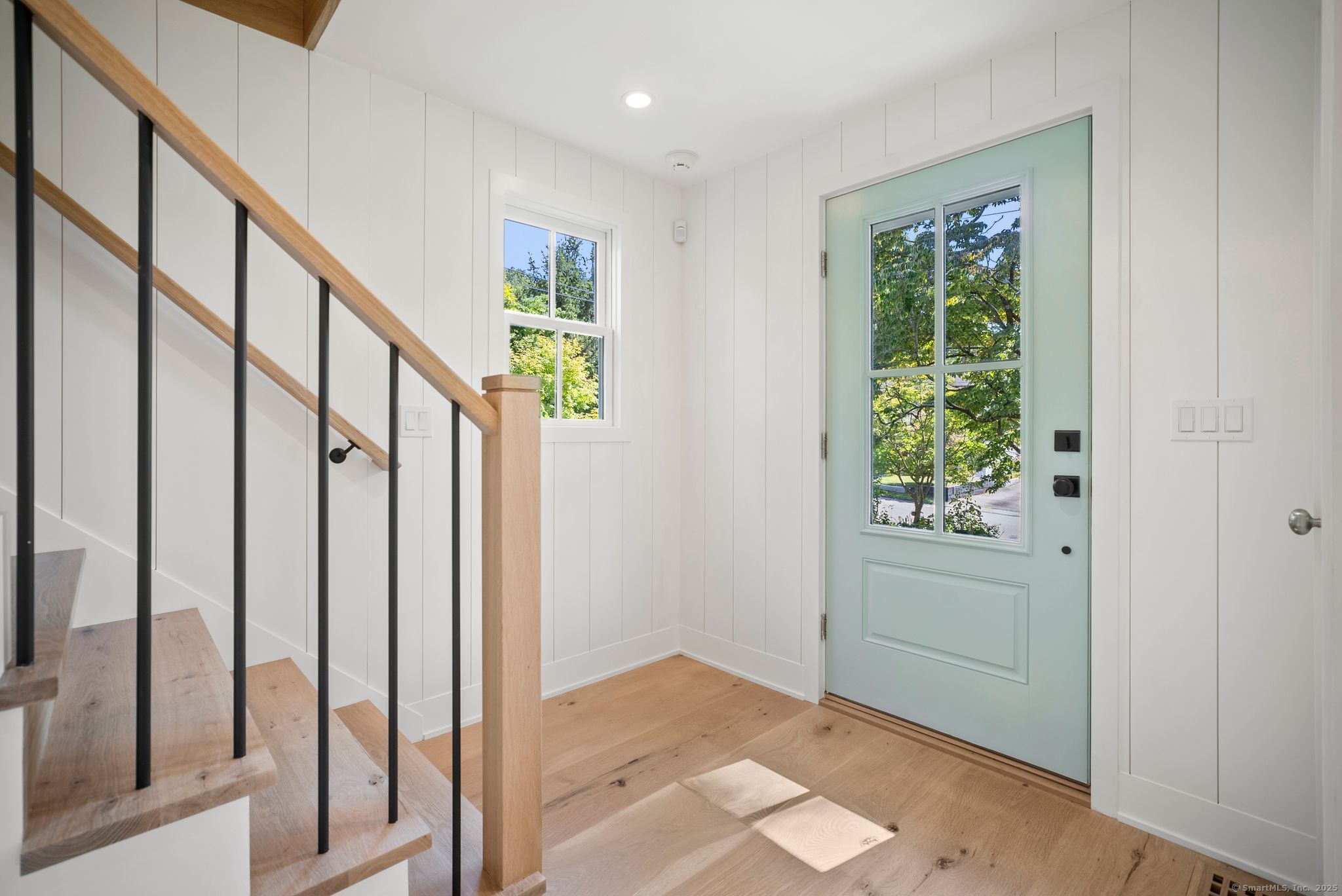 7 Wild Rose Road Westport, CT 06880 - Photo 3 of 33 a view of an entryway with wooden floor