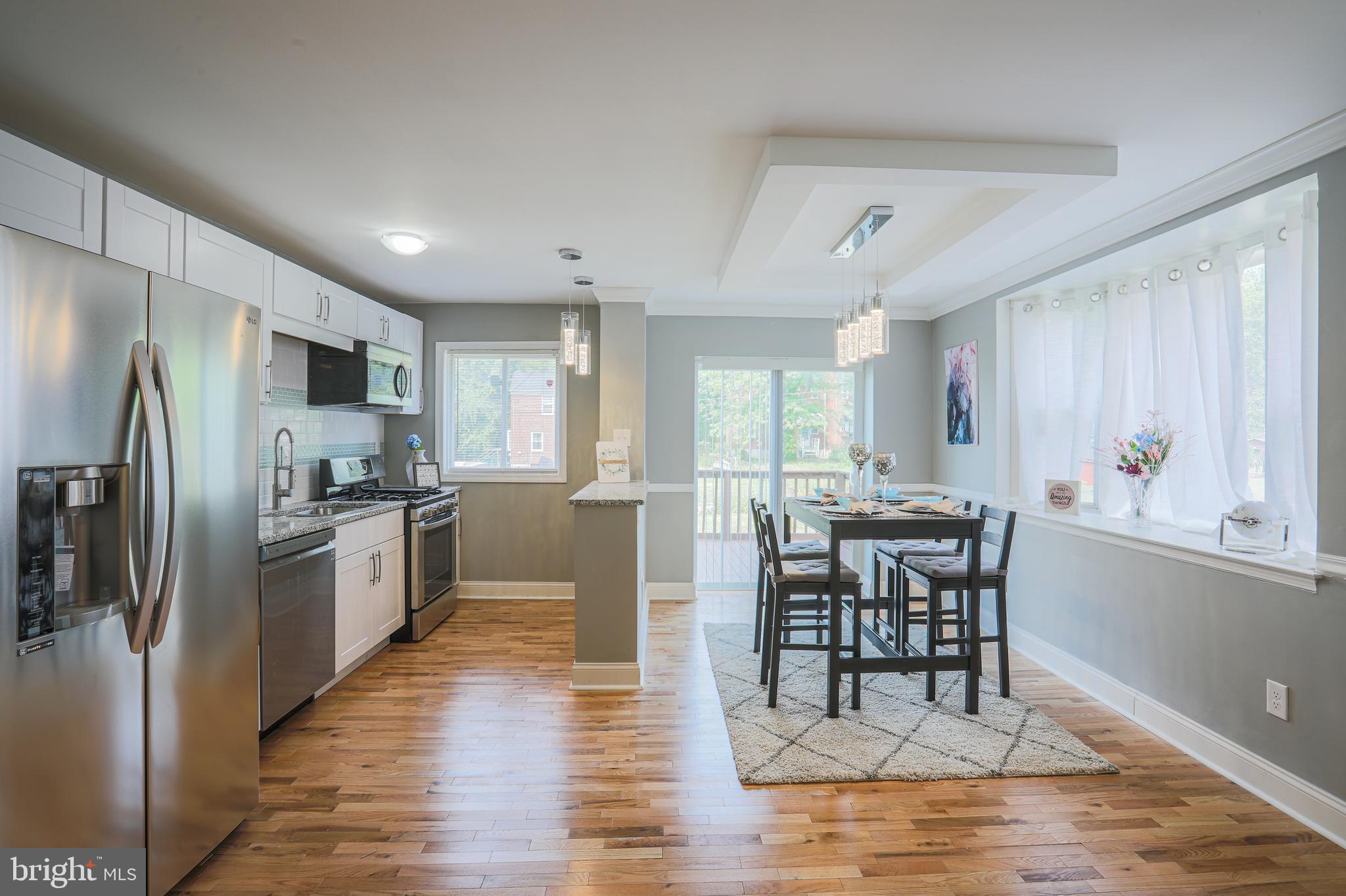 6210 Plymouth Road Baltimore, MD 21214 - Photo 16 of 63 Dining Room and Kitchen