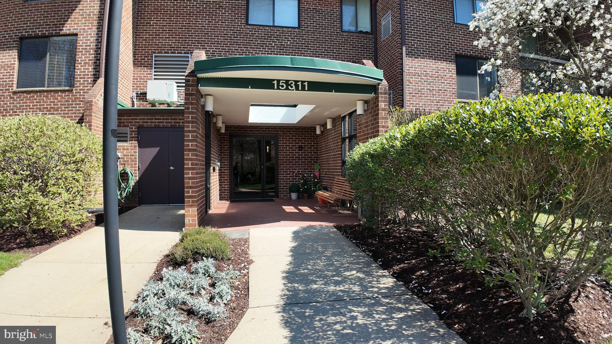 15311 Beaverbrook Court, Unit 903B Silver Spring, MD 20906 - Photo 2 of 36 a front view of a house