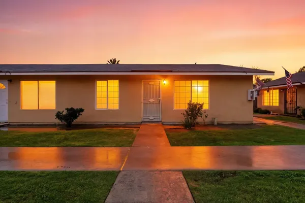 a view of swimming pool from a big yard