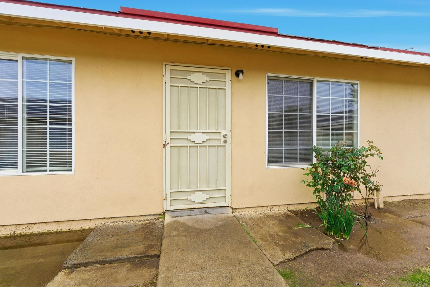 616 South Irwin Street, Unit C Hanford, CA 93230 - Photo 6 of 26 a view of house with front door