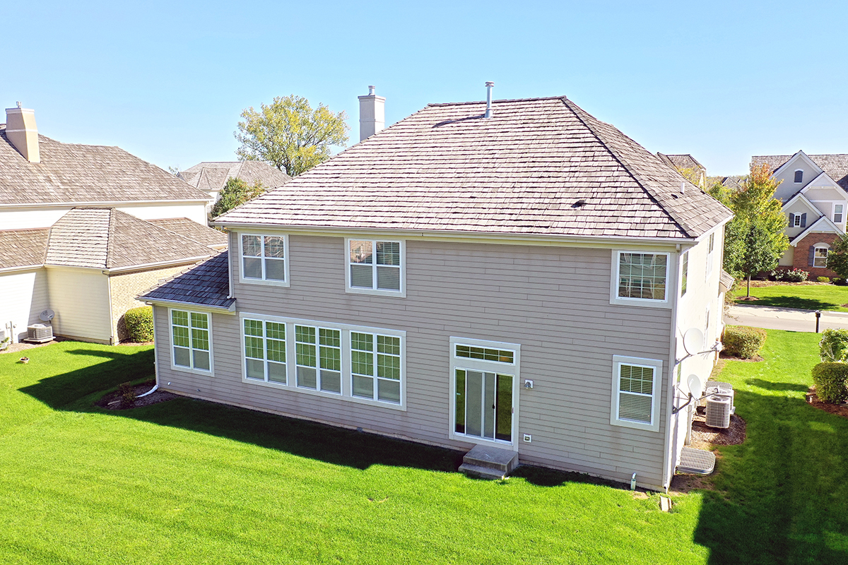 1118 Ashley Lane Inverness, IL 60010 - Photo 12 of 50 a front view of a house with a yard