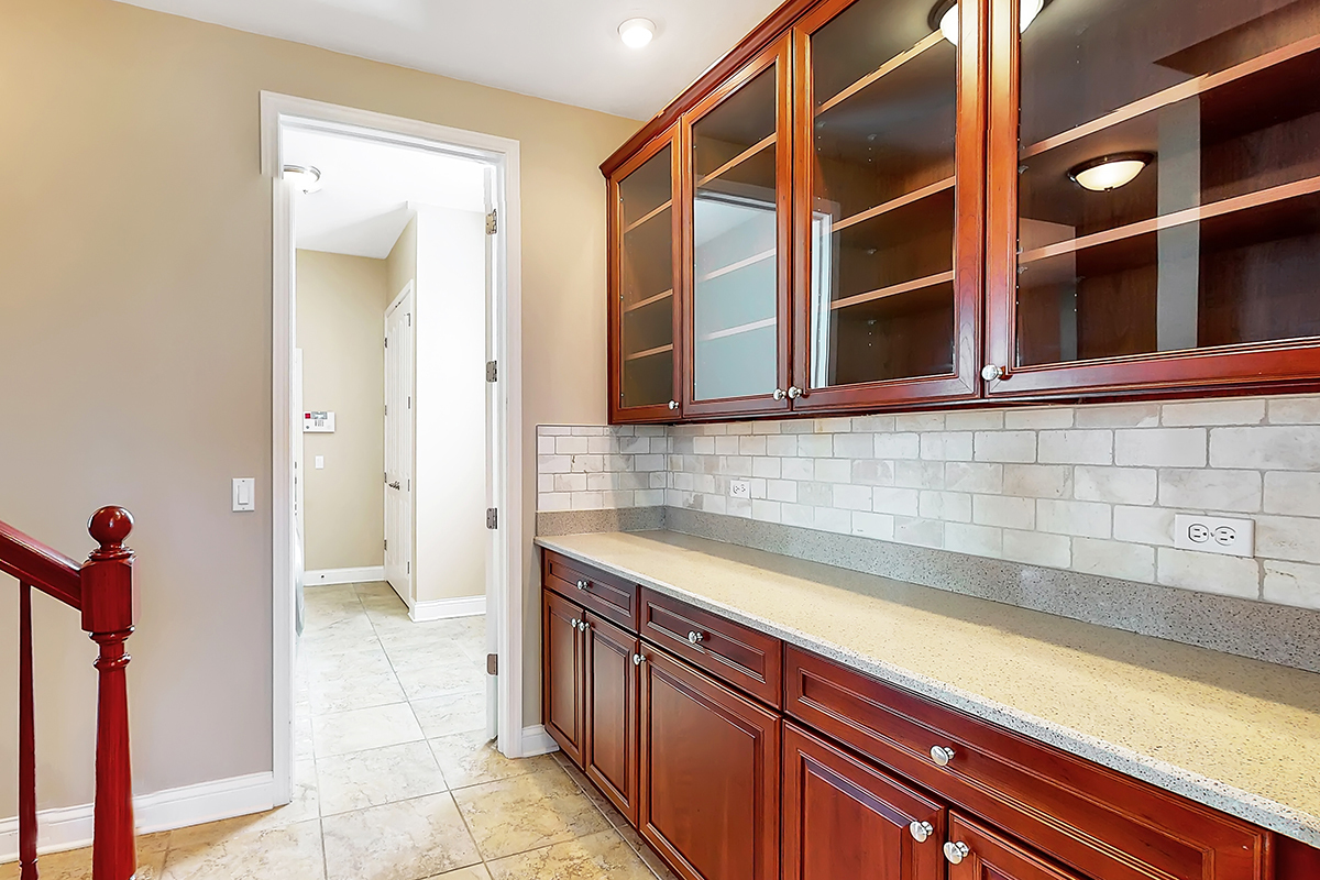 1118 Ashley Lane Inverness, IL 60010 - Photo 18 of 50 a kitchen with a sink and cabinets