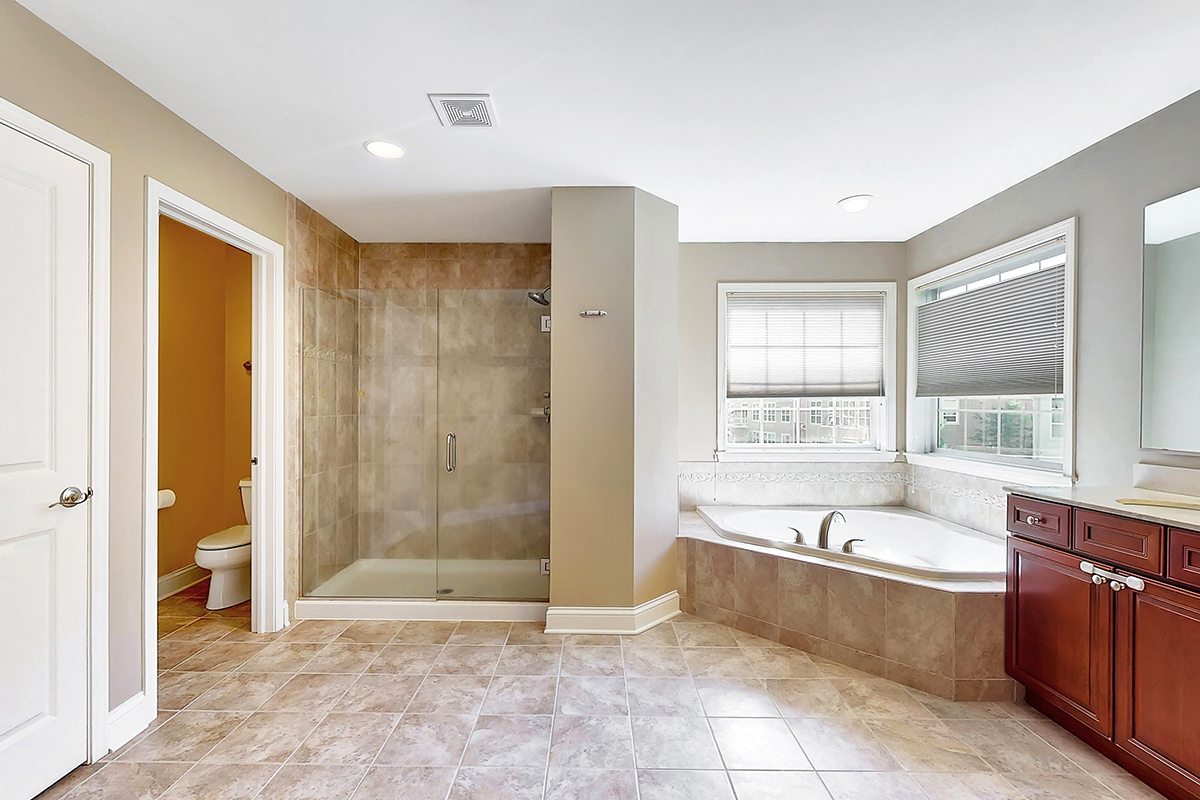1118 Ashley Lane Inverness, IL 60010 - Photo 30 of 50 a spacious bathroom with a tub shower and sink