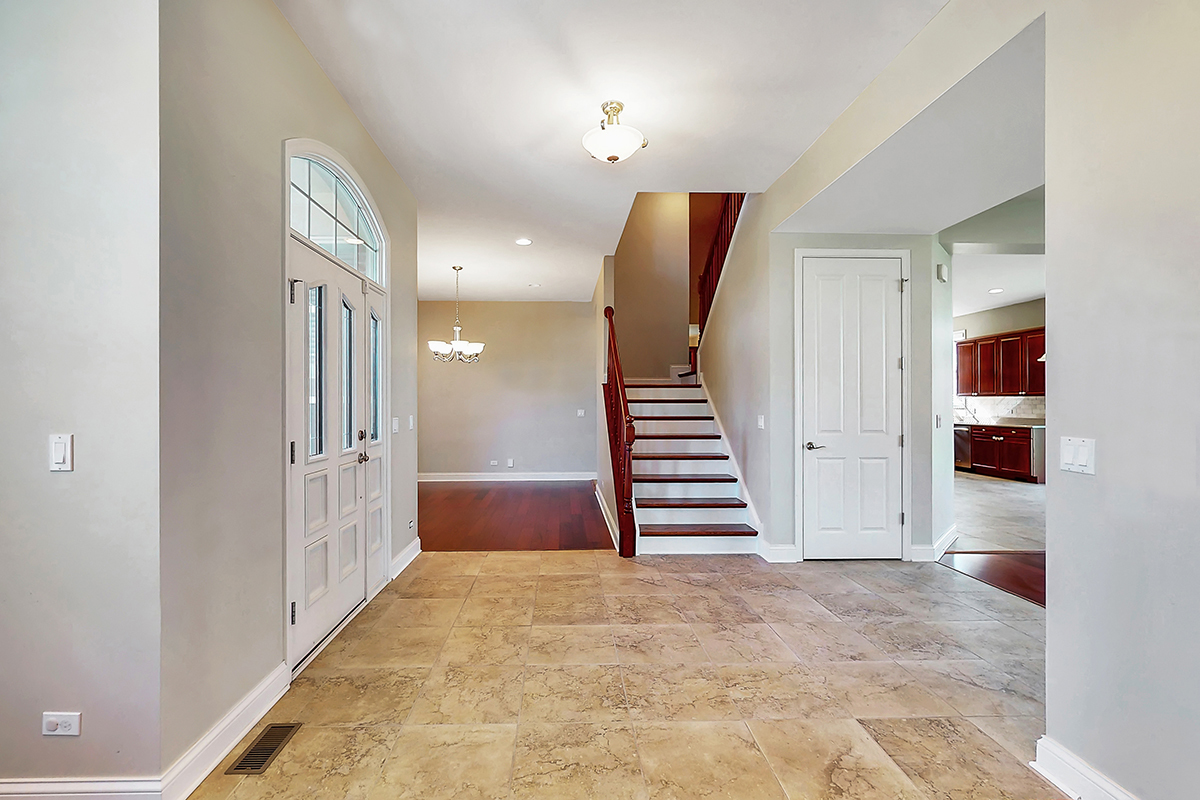 1118 Ashley Lane Inverness, IL 60010 - Photo 35 of 50 a view of entryway and hall with wooden floor