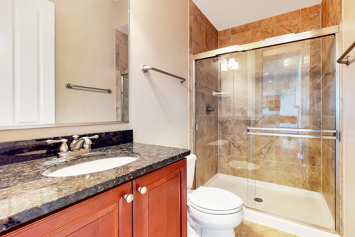 1118 Ashley Lane Inverness, IL 60010 - Photo 40 of 50 a bathroom with a granite countertop sink toilet and shower