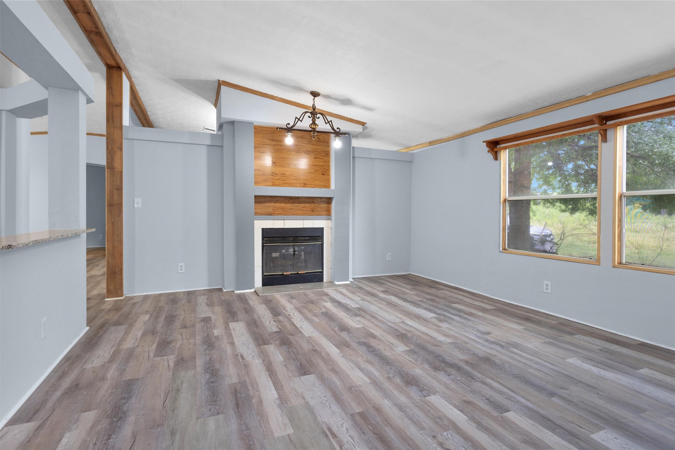 1001 County Line Road Shepherd, TX 77371 - Photo 20 of 46 a view of empty room with wooden floor and fan