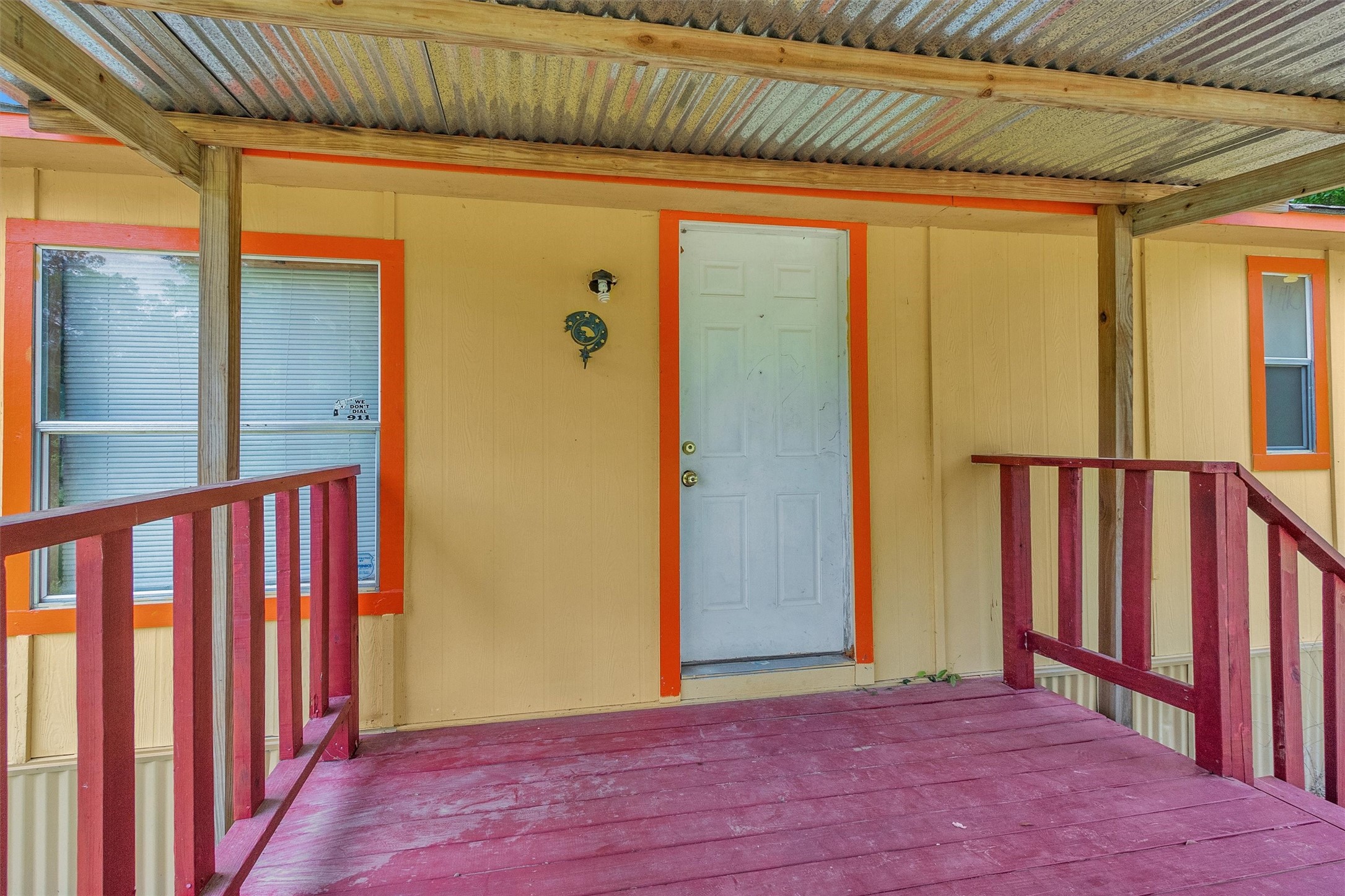1001 County Line Road Shepherd, TX 77371 - Photo 35 of 46 an empty room with wooden floor and windows