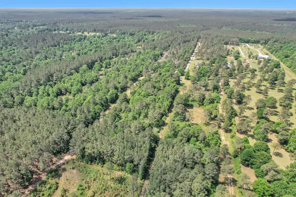 a view of a yard with an outdoor space