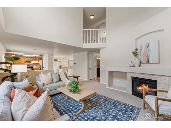 a living room with furniture and a table