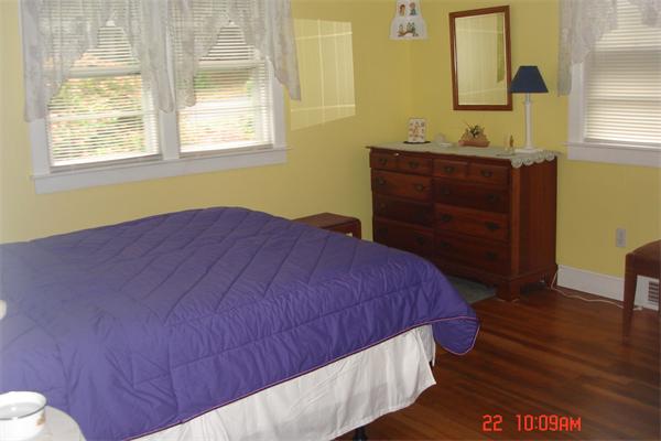 172 Telegraph Road Dennis, MA 02639 - Photo 6 of 9 a bed sitting in a bathroom next to a window