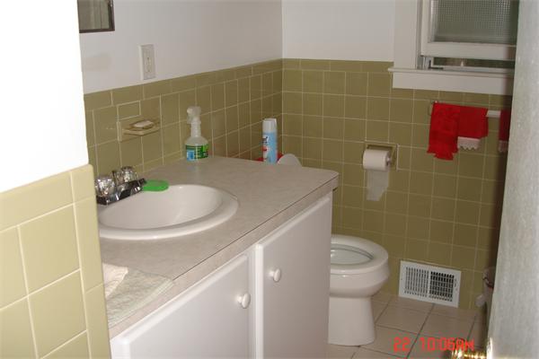 172 Telegraph Road Dennis, MA 02639 - Photo 8 of 9 a bathroom with a sink a toilet and a mirror