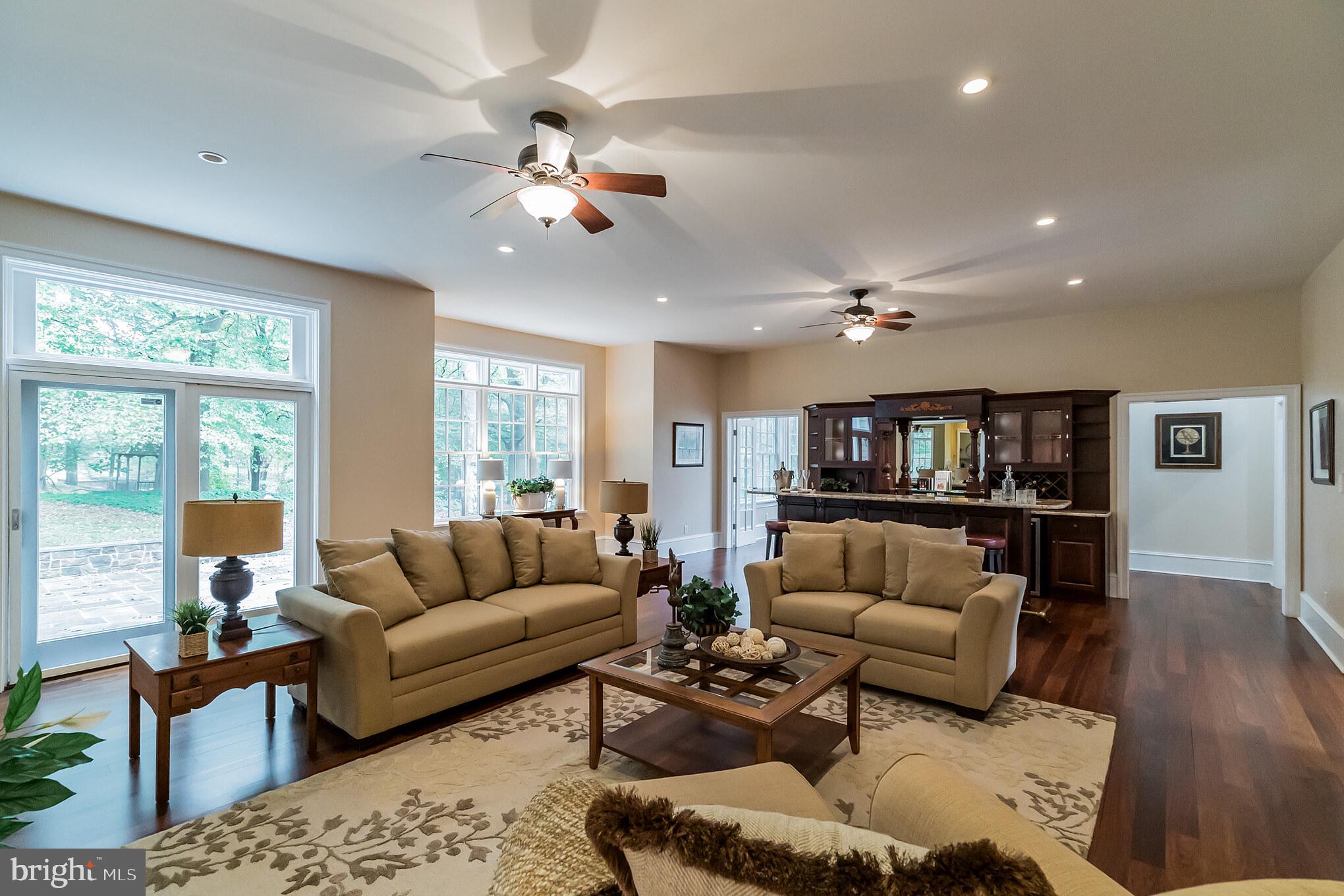 9 Sugarbrook Road Malvern, PA 19355 - Photo 9 of 48 Spacious great room with custom bar!