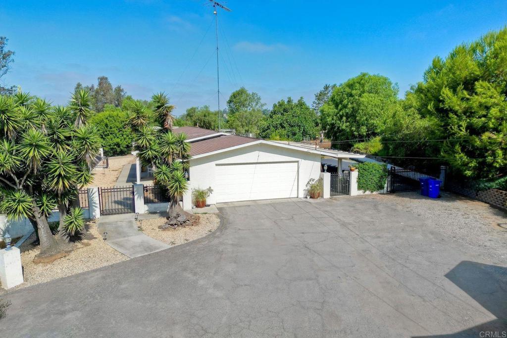 548 Taylor Street Vista, CA 92084 - Photo 2 of 74 a view of a house with a yard and potted plants