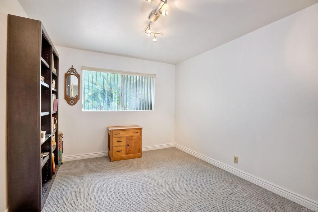 548 Taylor Street Vista, CA 92084 - Photo 26 of 74 an empty room with windows