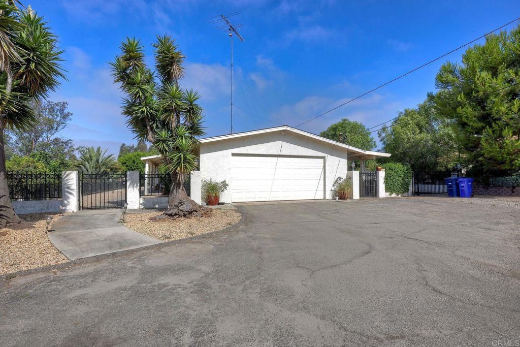 548 Taylor Street Vista, CA 92084 - Photo 45 of 74 a view of a house with a yard and garage