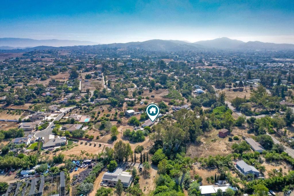 548 Taylor Street Vista, CA 92084 - Photo 69 of 74 an aerial view of residential houses with outdoor space and trees