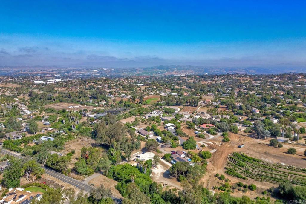 548 Taylor Street Vista, CA 92084 - Photo 72 of 74 an aerial view of residential house with parking and yard