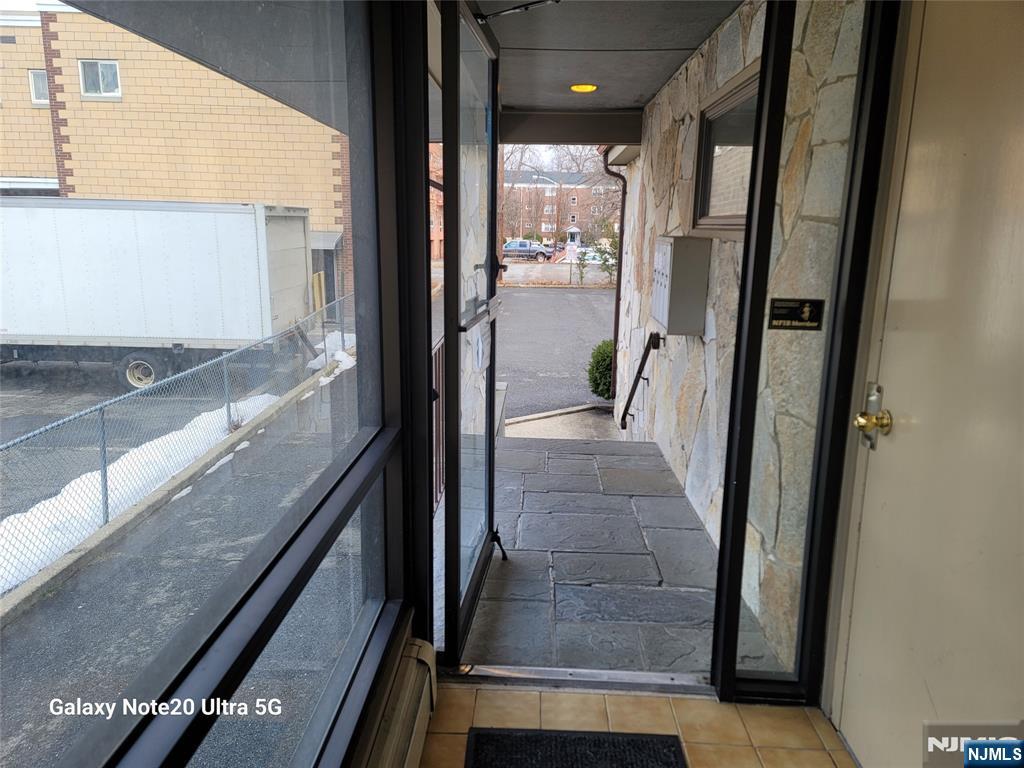 16 Jefferson Street Hackensack, NJ 07601 - Photo 5 of 29 a view of a living room and a balcony