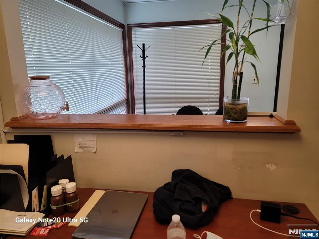 16 Jefferson Street Hackensack, NJ 07601 - Photo 8 of 29 a room with a window and gym equipment