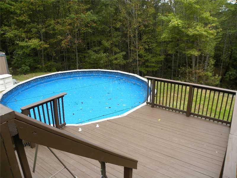 646 Quaker Ridge Road Leeds, ME 04263 - Photo 7 of 20 Patio/Deck. LOWER LEVEL DECK & POOL