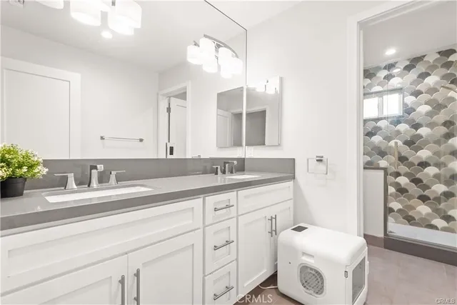 a bathroom with a toilet and a shower curtain