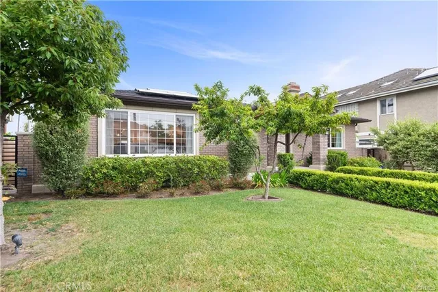 an aerial view of residential house with outdoor space