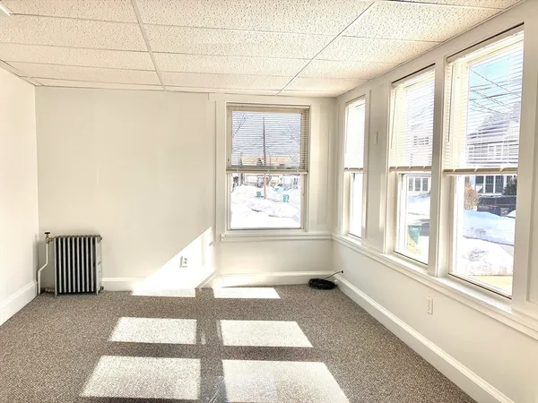 a view of a refrigerator in a kitchen