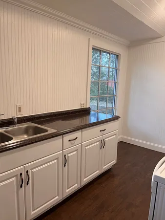 a close view of sink and mirror