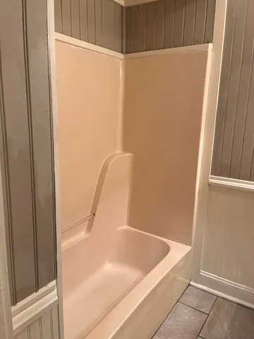 a bathroom with a bathtub