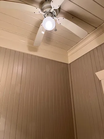 a bathroom with a shower and a curtain