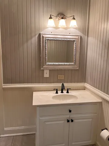 a sink with a mirror