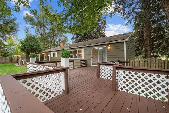 a front view of a house with parking space