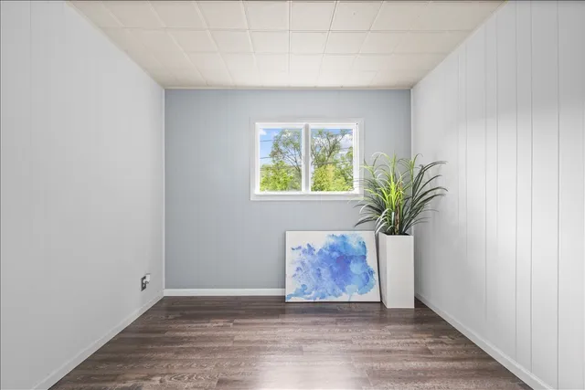 a view of an empty room and window