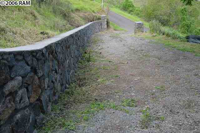 0 Koheo Road Kula, HI 96790 - Photo 5 of 20 a view of a dry yard with wooden fence