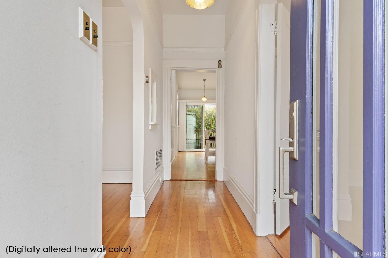 3754 Cesar Chavez San Francisco, CA 94110 - Photo 2 of 16 a view of a hallway with wooden floor and staircase