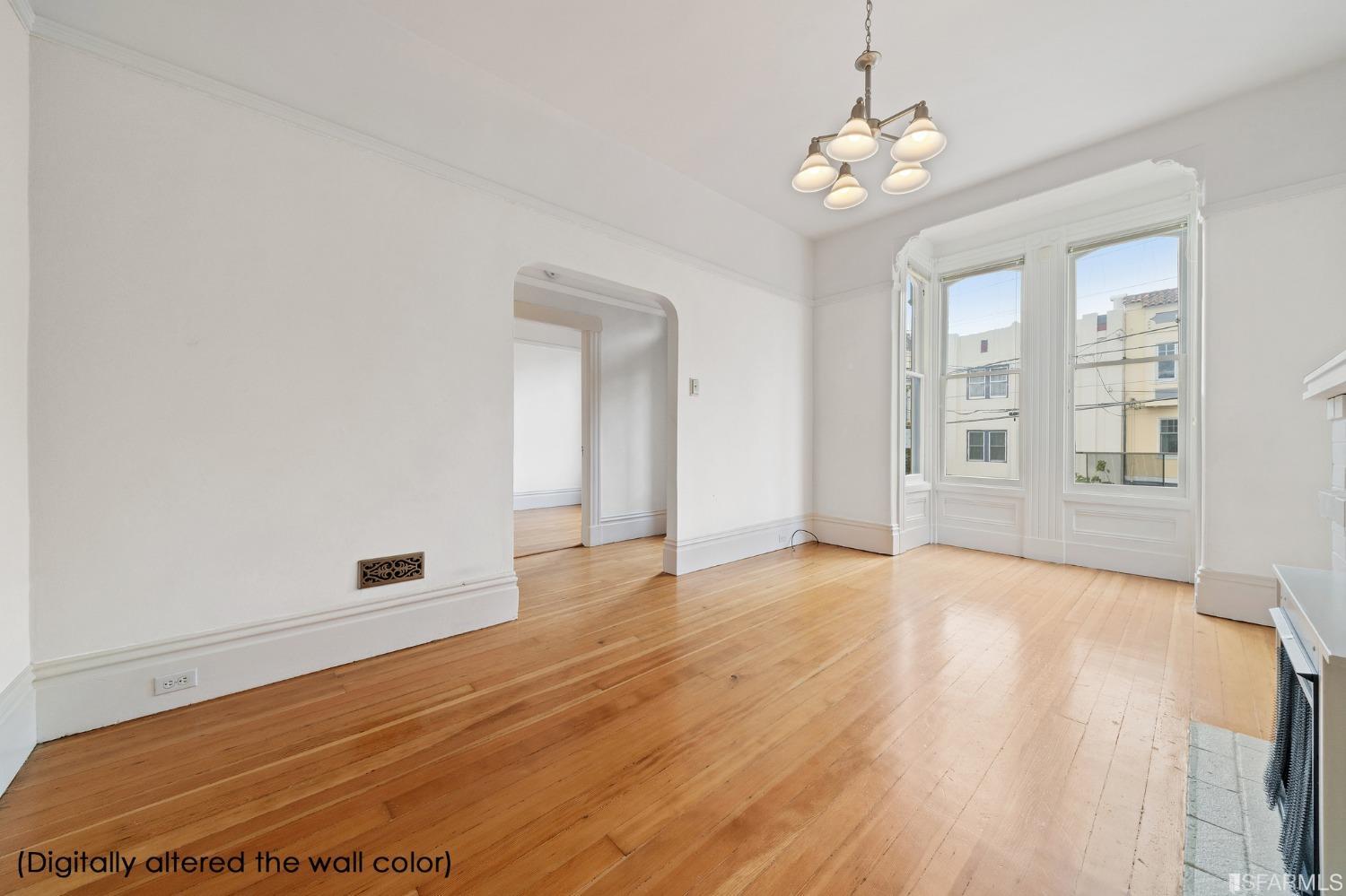 3754 Cesar Chavez San Francisco, CA 94110 - Photo 4 of 16 wooden floor in an empty room with a window