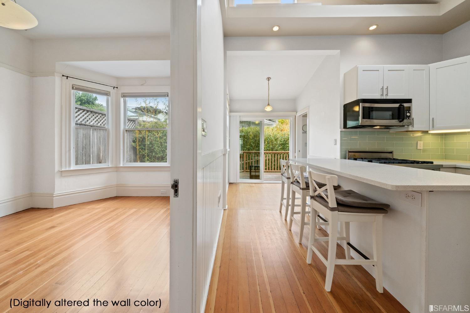 3754 Cesar Chavez San Francisco, CA 94110 - Photo 7 of 16 a kitchen with stainless steel appliances a stove top oven a sink and a refrigerator