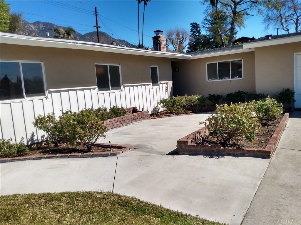 357 Parkman Street Altadena, CA 91001 - Photo 11 of 73 a view of a house with a yard