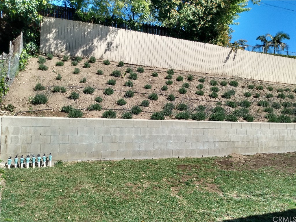 357 Parkman Street Altadena, CA 91001 - Photo 17 of 73 a view of outdoor space with swimming pool and green space