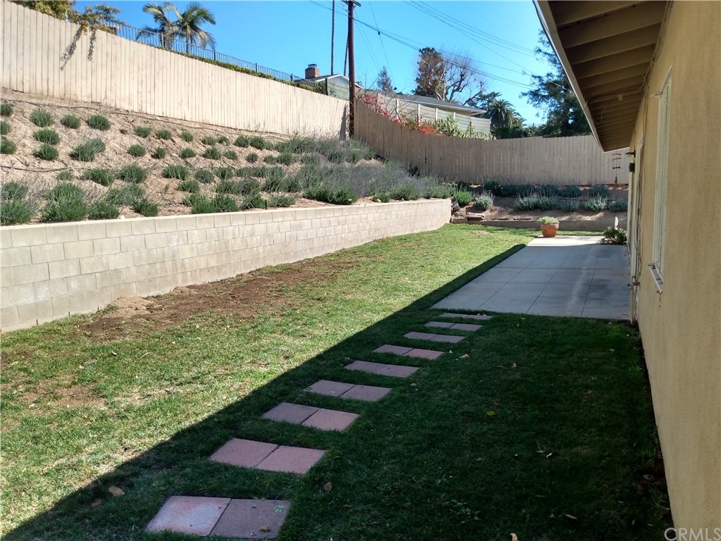 357 Parkman Street Altadena, CA 91001 - Photo 19 of 73 a view of a yard with an outdoor space