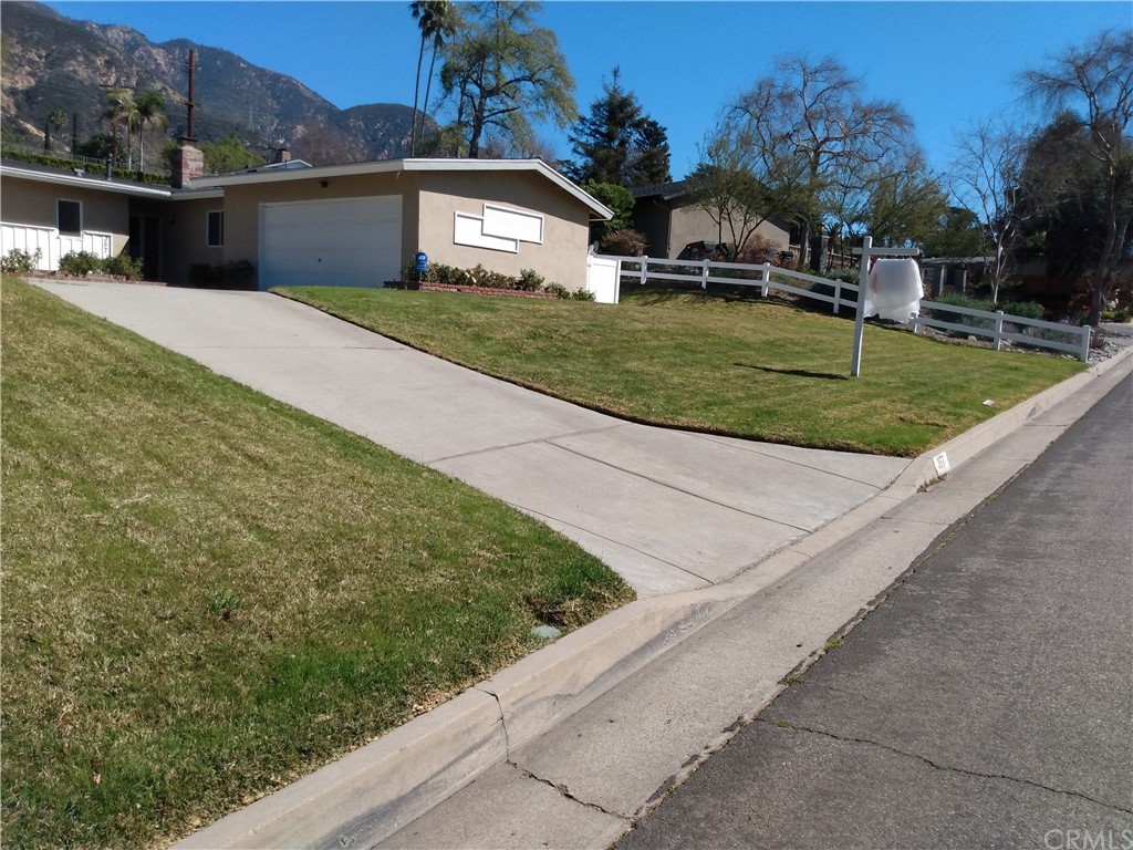 357 Parkman Street Altadena, CA 91001 - Photo 2 of 73 a front view of a house with a yard