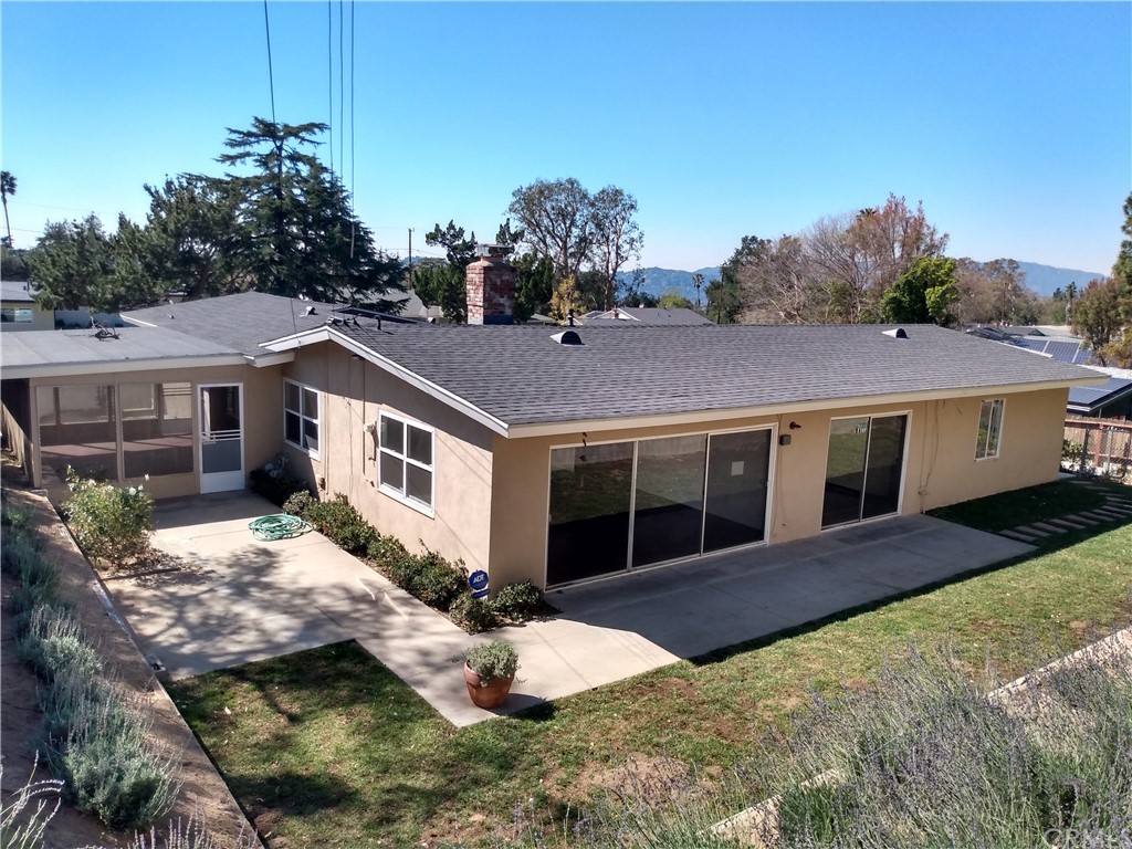 357 Parkman Street Altadena, CA 91001 - Photo 29 of 73 a view of a house with a yard
