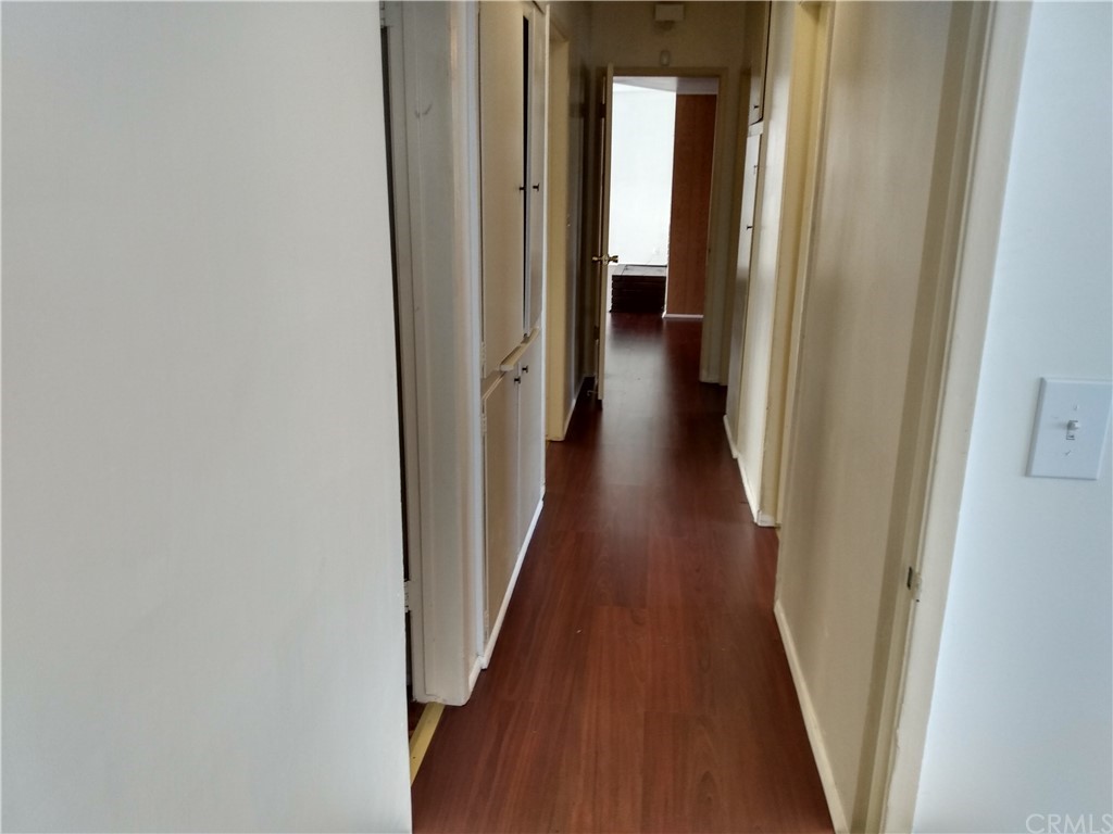357 Parkman Street Altadena, CA 91001 - Photo 61 of 73 a view of a hallway with wooden floor