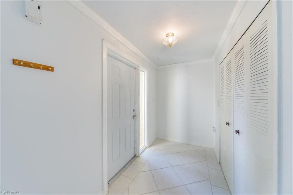 925 Palm View Drive, Unit E118 Naples, FL 34110 - Photo 2 of 26 a view of an empty room
