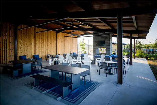 a outdoor living space with furniture and garden view