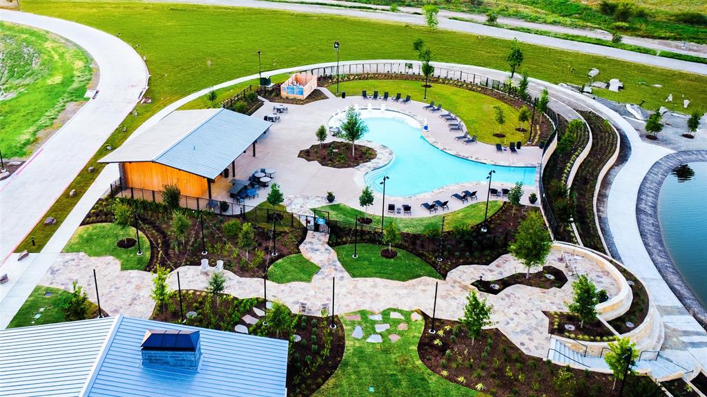 172 Summer Rain Way Newark, TX 76071 - Photo 10 of 11 an aerial view of a swimming pool patio and outdoor seating