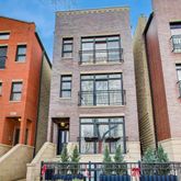 a front view of a multi story residential apartment building