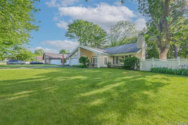 a house view with a garden space